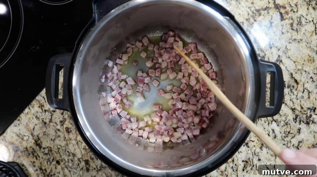 Creamy Instant Pot Chicken Baconara Pasta 8 Sautéing pancetta.