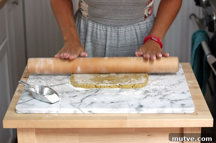 rolling tart dough for Fig Mascarpone Tart with Pistachio Black Pepper Crust