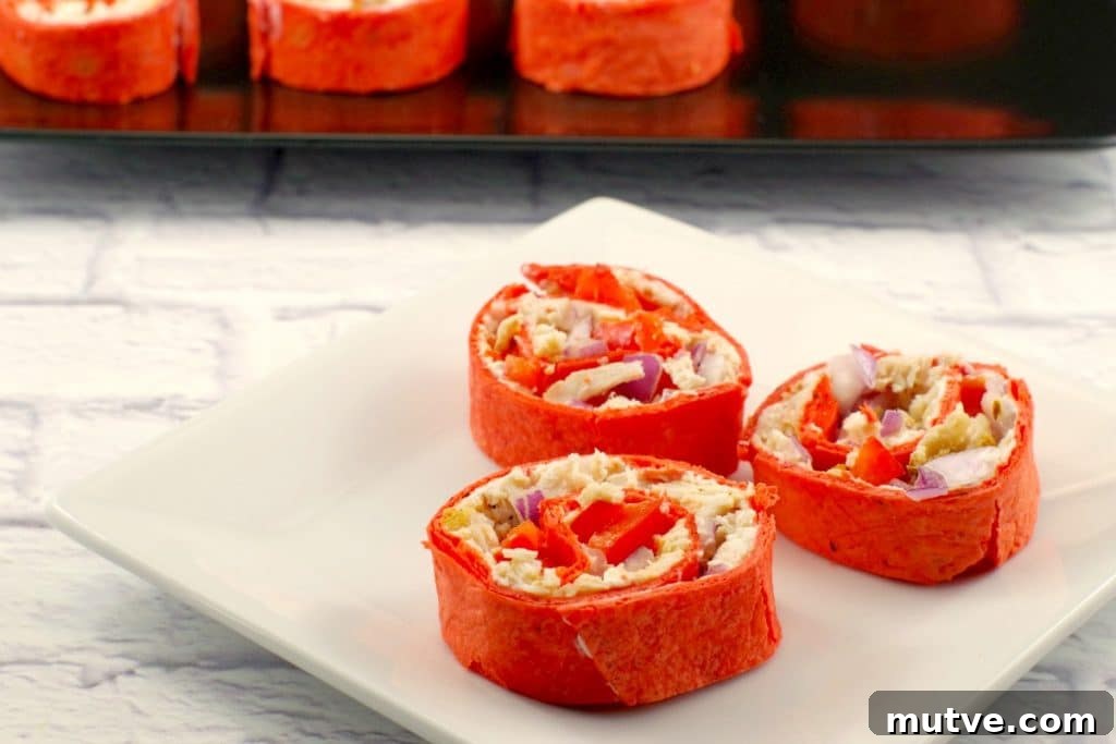 Chicken Tortilla Pinwheels Recipe: Cheesy Party Appetizer 2 Tortilla Pinwheels | chicken - foodmeanderings.com