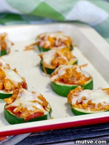 Chicken Tortilla Pinwheels Recipe: Cheesy Party Appetizer 17 buffalo chicken zucchini pizza recipe on an off-white baking tray
