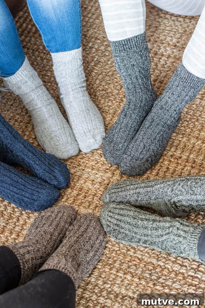 Girls with feet in a circle with cozy christmas socks