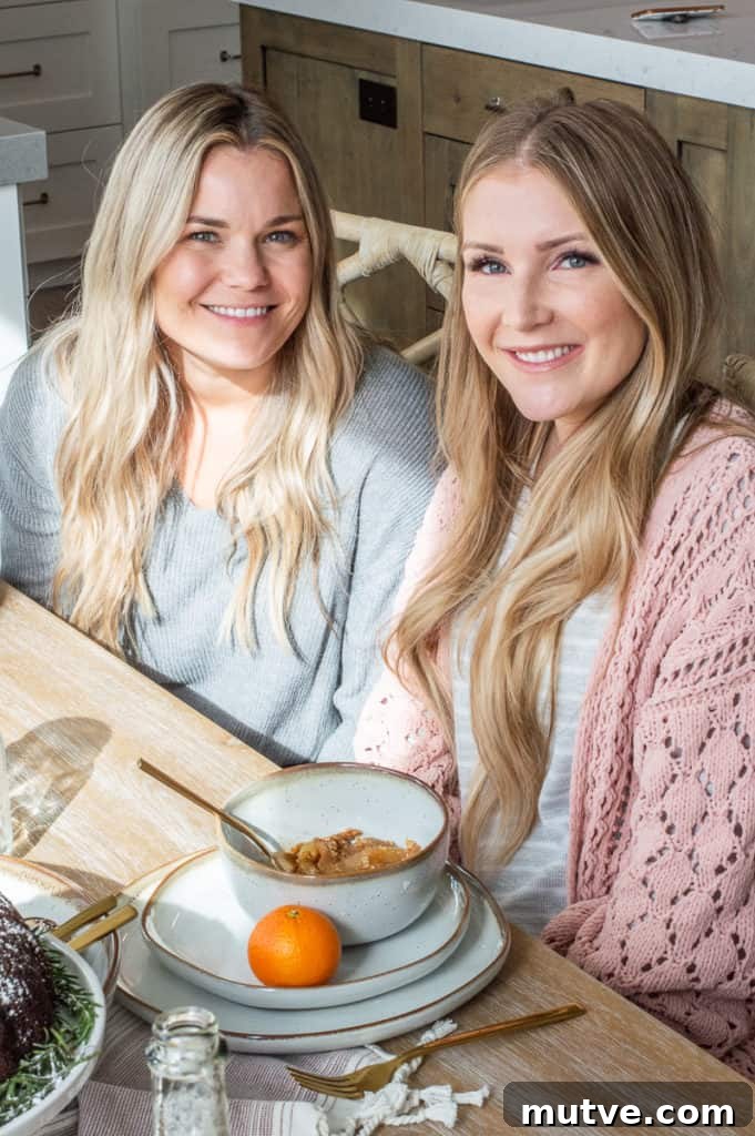 Two girls smiling at Hygge Christmas breakfast