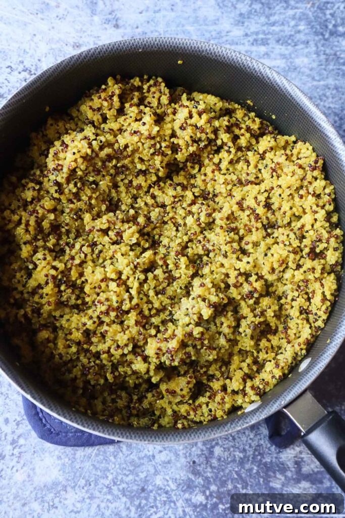 Mediterranean Power Bowl Recipe with Chickpeas and Tahini 4 sauce pan with cooked quinoa