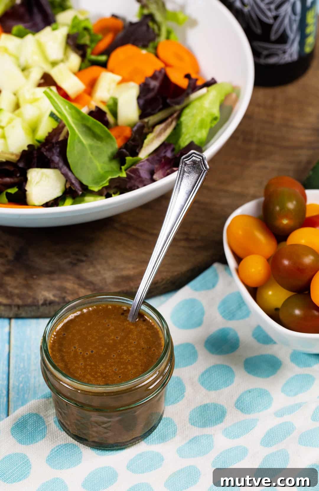 Creamy Balsamic Dressing in a small jar.