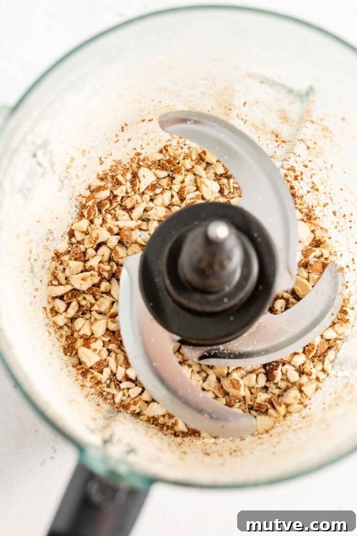 Homemade Apricot Muesli Granola Bars 4 Blended almonds in a food processor.