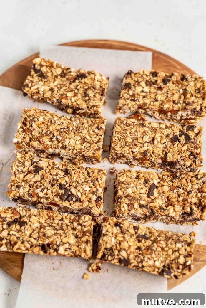 Homemade Apricot Muesli Granola Bars 10 8 large granola bars on a cutting board.