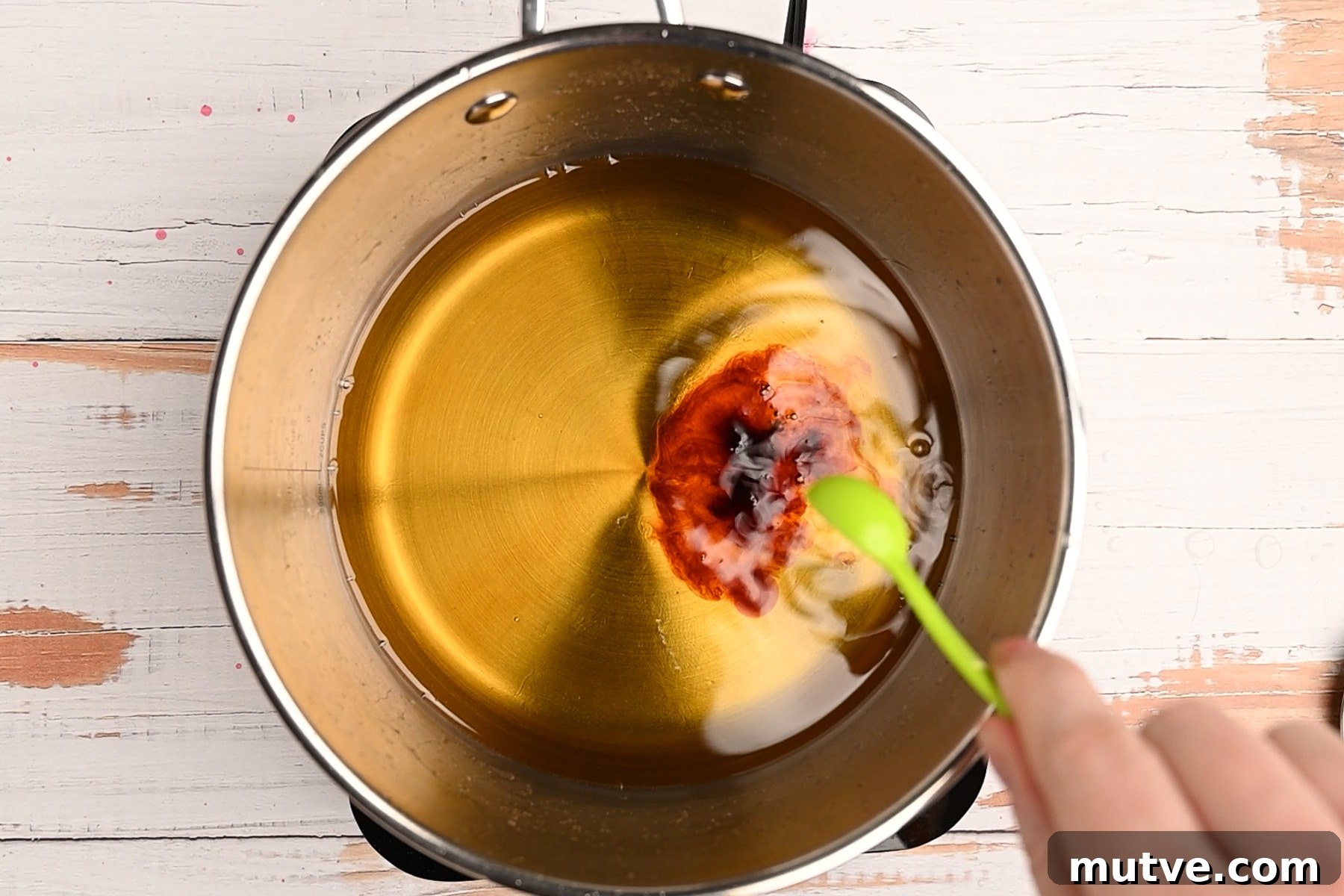 How to Make Keto Maple Syrup That Won't Crystallize 6 Flavoring being added to heated allulose.