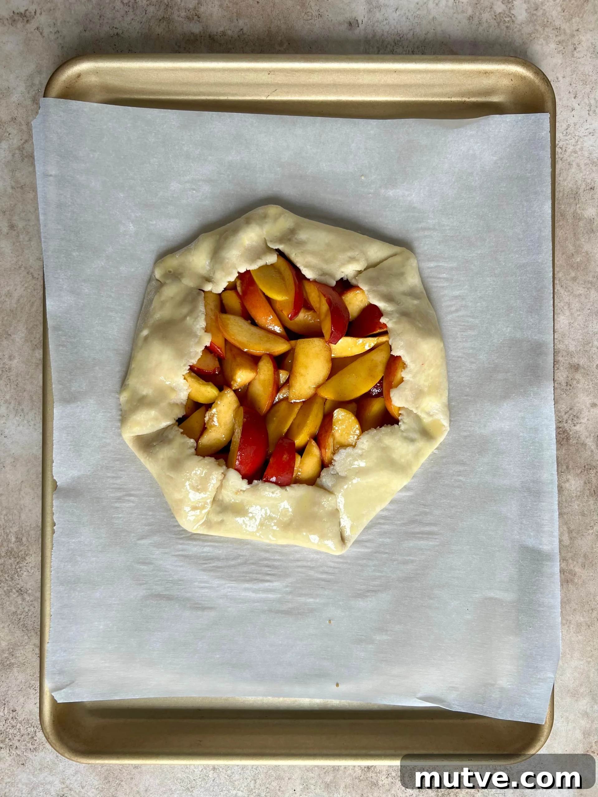 Rustic Peach Galette Recipe with Honey and Almonds 9 Slice of peach galette