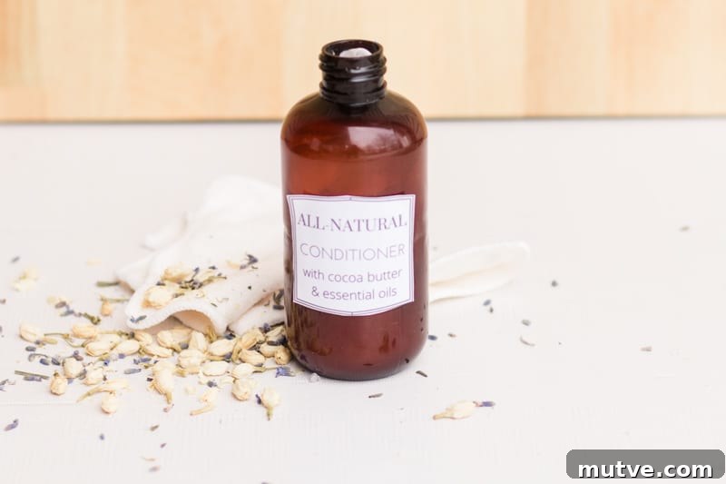 Homemade hair conditioner on marble vanity.