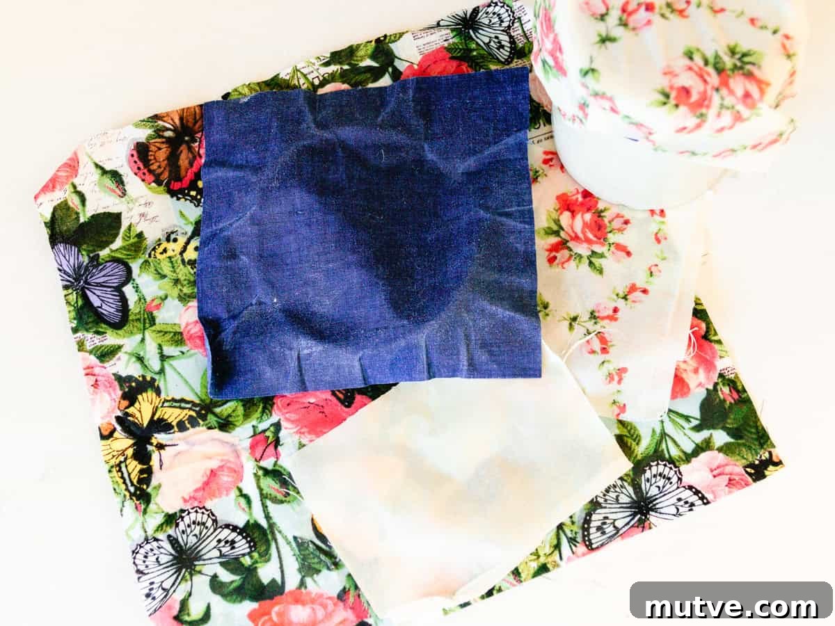 Beeswax wraps stacked on a kitchen counter.