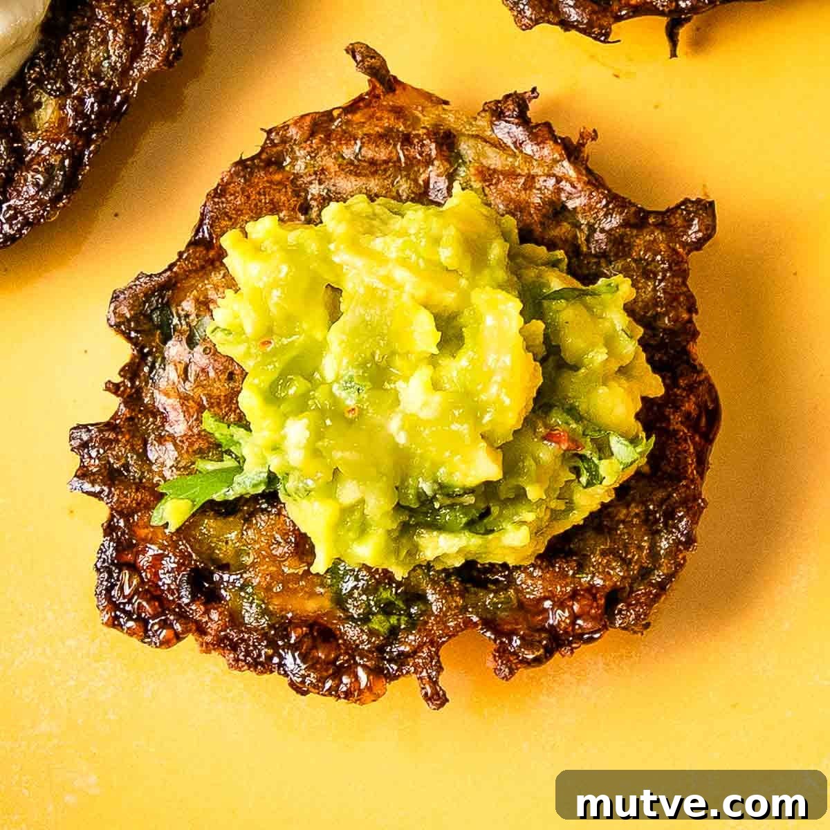 Crispy Oven Baked Brussels Sprouts Latkes 9 Crispy latke topped with guacamole.