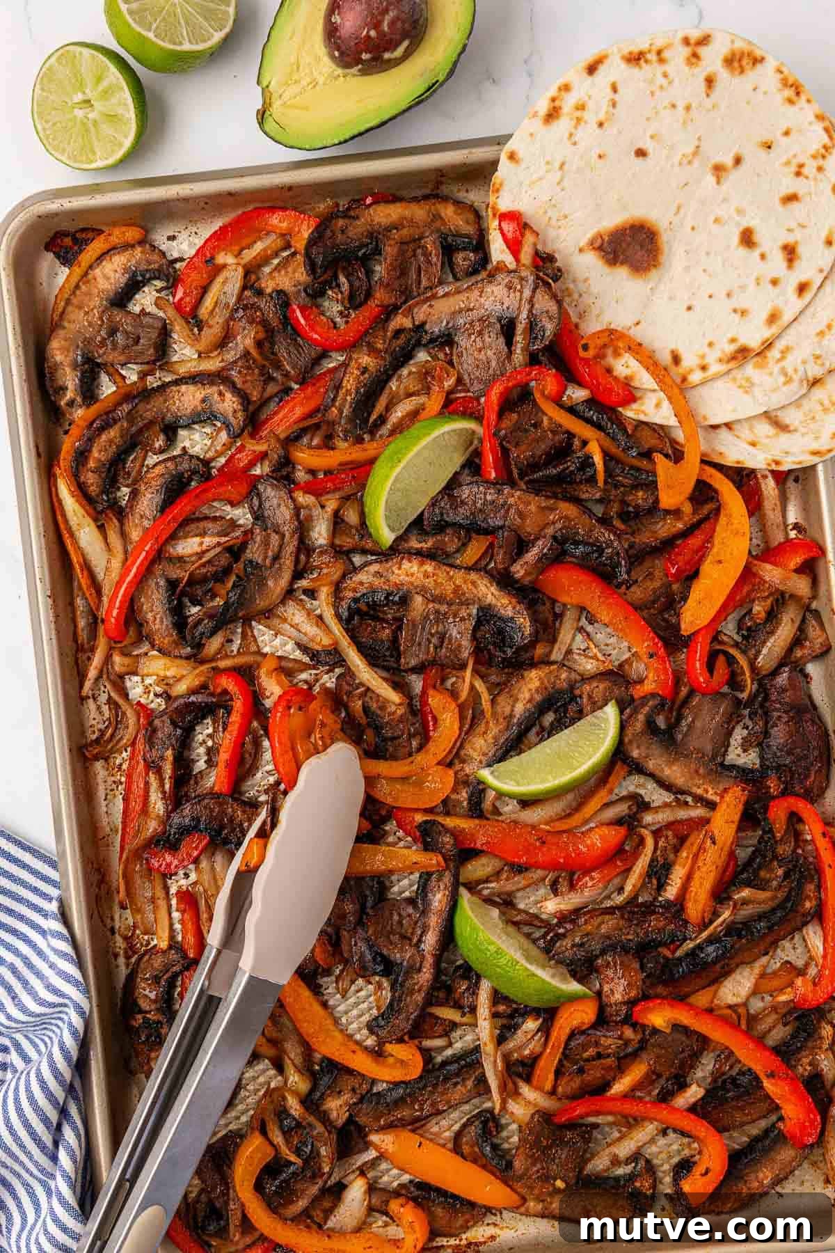 How to Make Portobello Mushroom Fajitas with Peppers and Onions 2 roasted portobello mushrooms, bell peppers, and onions