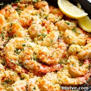 Crispy Oven-Baked Shrimp Scampi Recipe with Garlic Butter 8 Oven baked shrimp with a hint of lemon and garlic, topped with flavorful golden and buttery, garlic parmesan breadcrumbs.