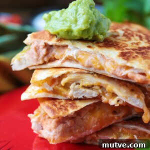 chicken quesadillas with guacamole on top
