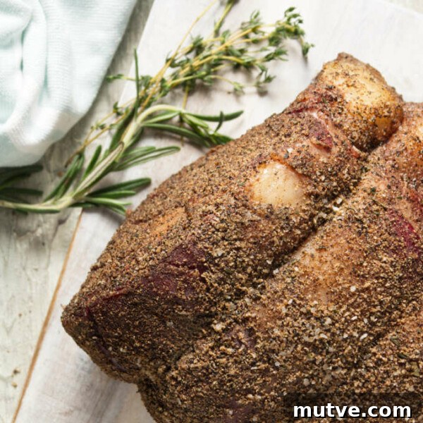 Traeger smoked prime rib resting on cutting board