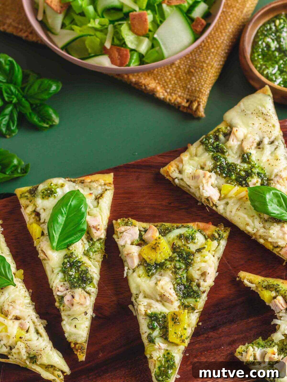 Pesto Chicken Flatbread Pizza Recipe 2 pizza on a serving board.