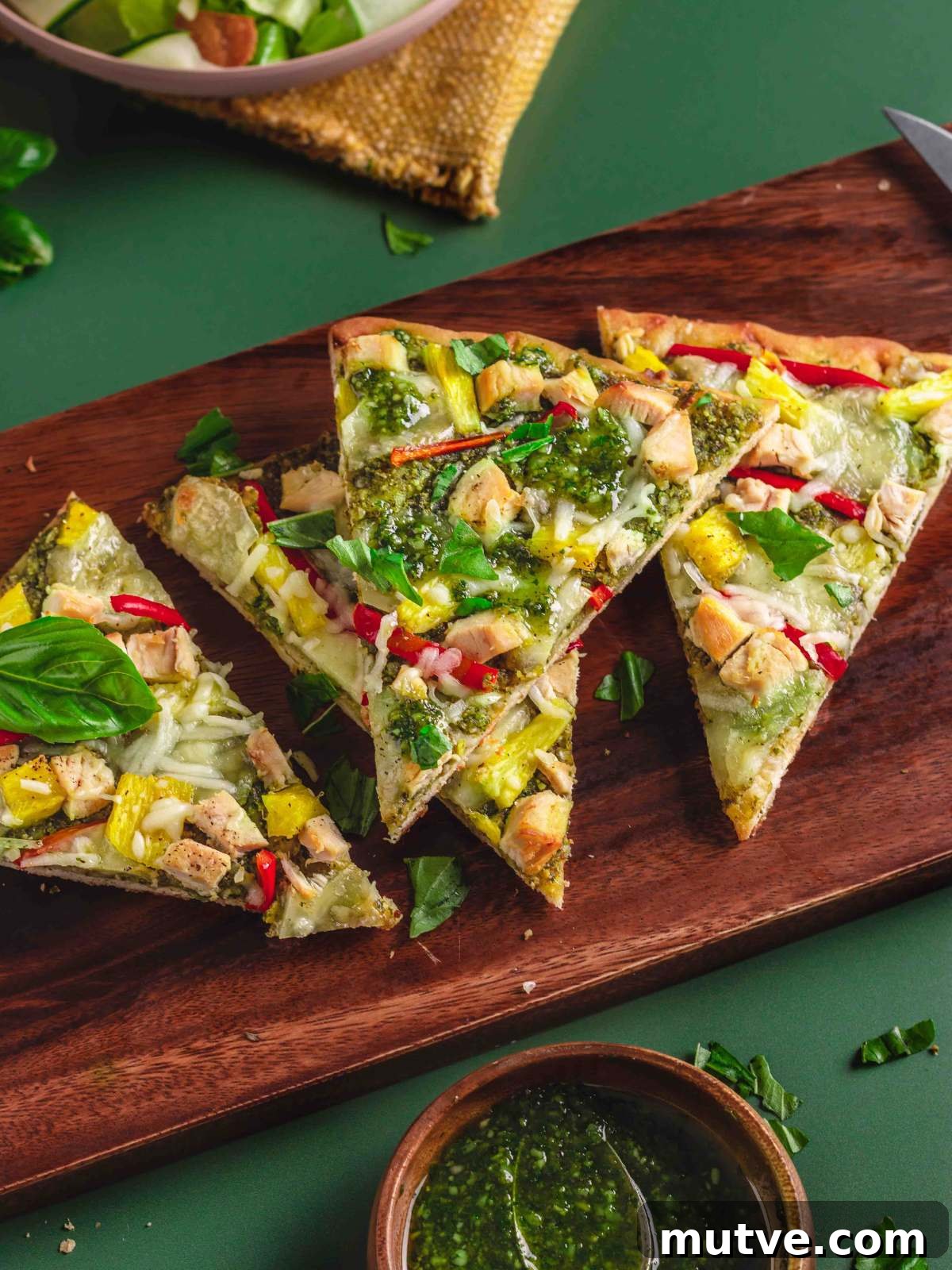 Pesto Chicken Flatbread Pizza Recipe 4 sweet peppers added to the pizza drizzled with pesto.
