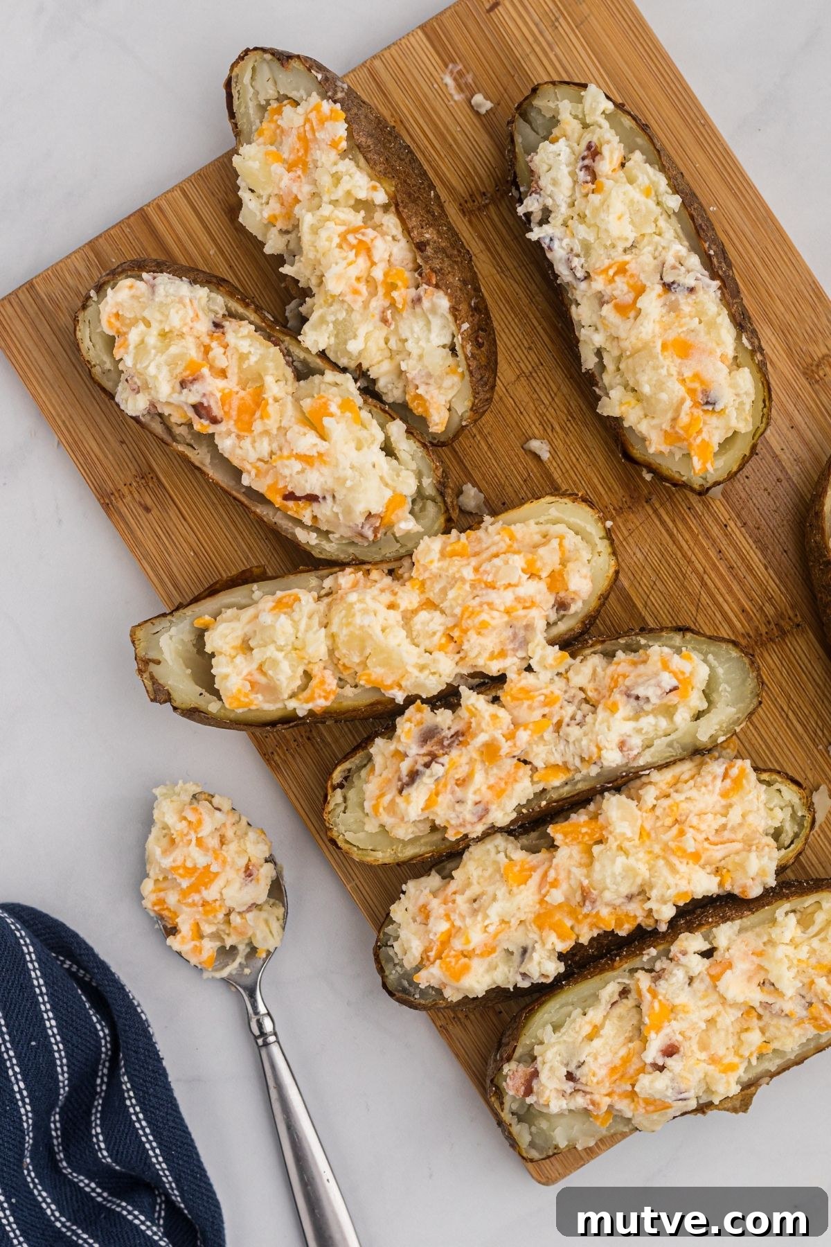 Twice baked potato filling added to the potato halves. 