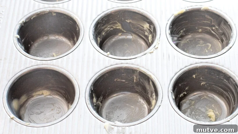 Bacon and Egg Breakfast Muffins Recipe 5 Muffin tin that has been greased with butter.