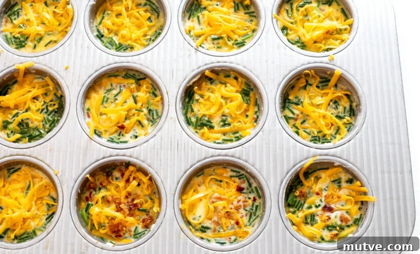 Bacon and Egg Breakfast Muffins Recipe 7 Egg mixture in the muffin tin before being baked.