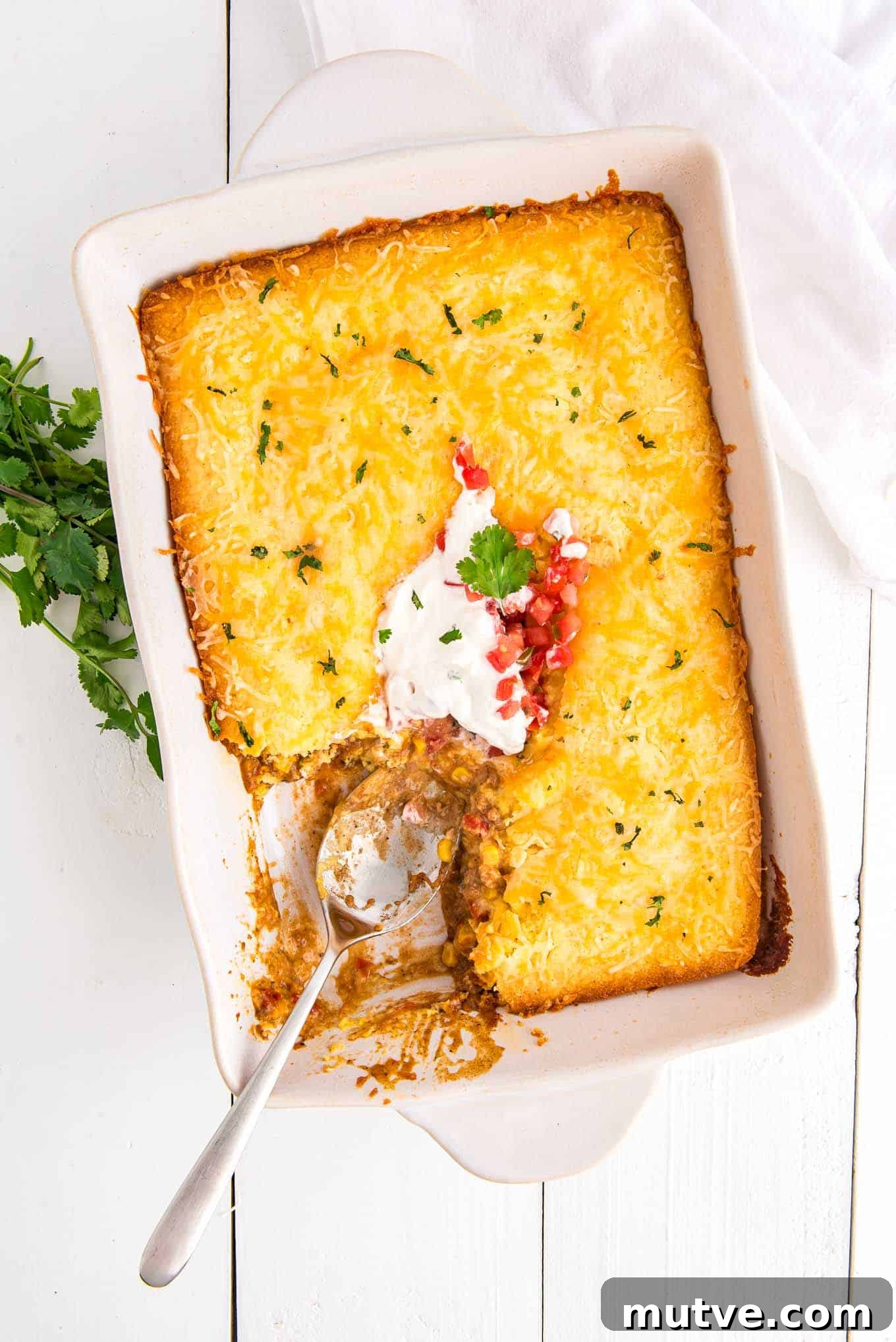 Baking pan of Mexican Cornbread Casserole.