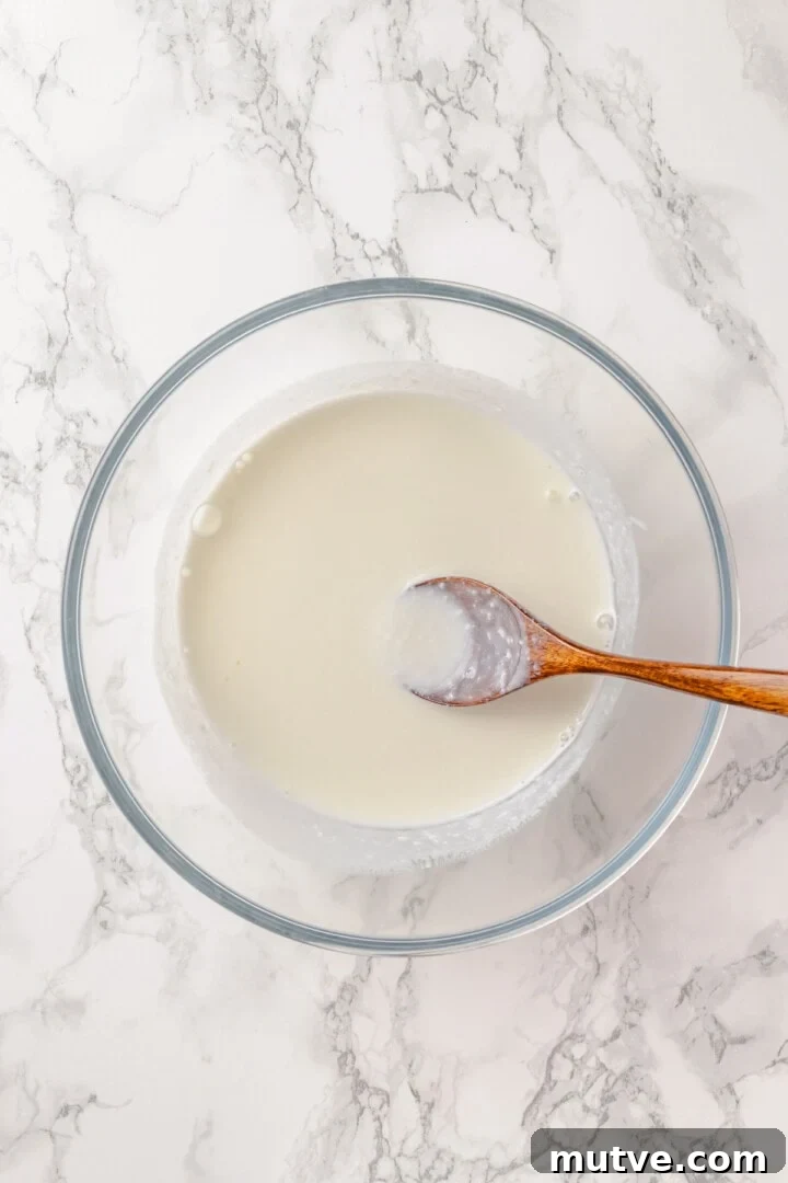 Overhead view of buttermilk mixture for protein pancakes