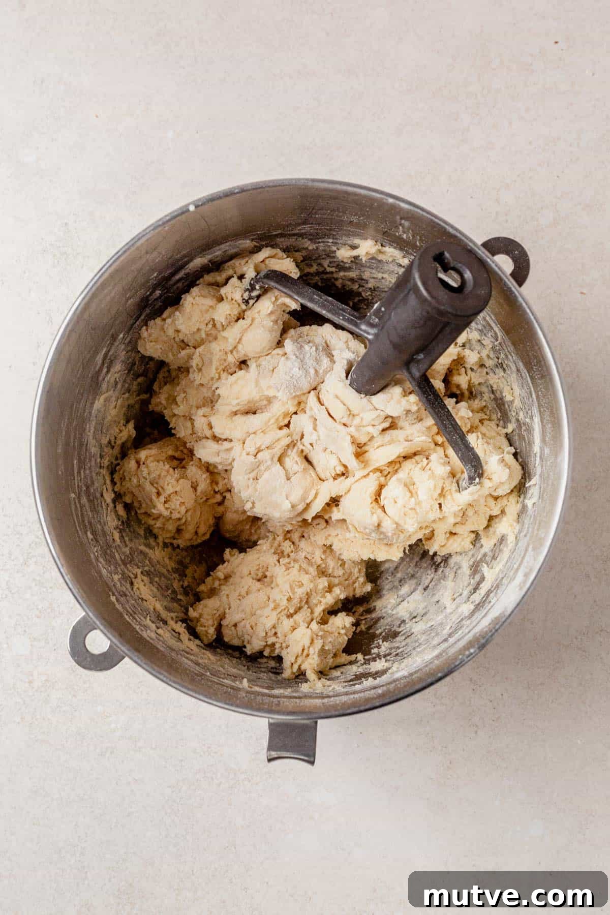 dinner rolls dough in a mixer.