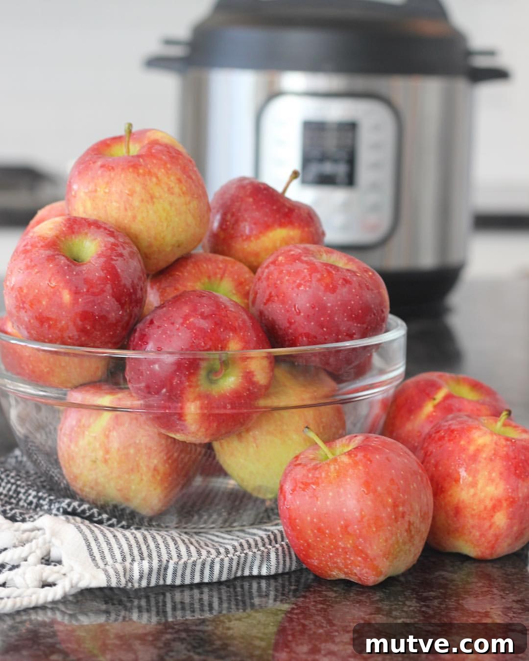 Homemade Applesauce Recipe from Scratch with Cinnamon 3 Apples being prepared