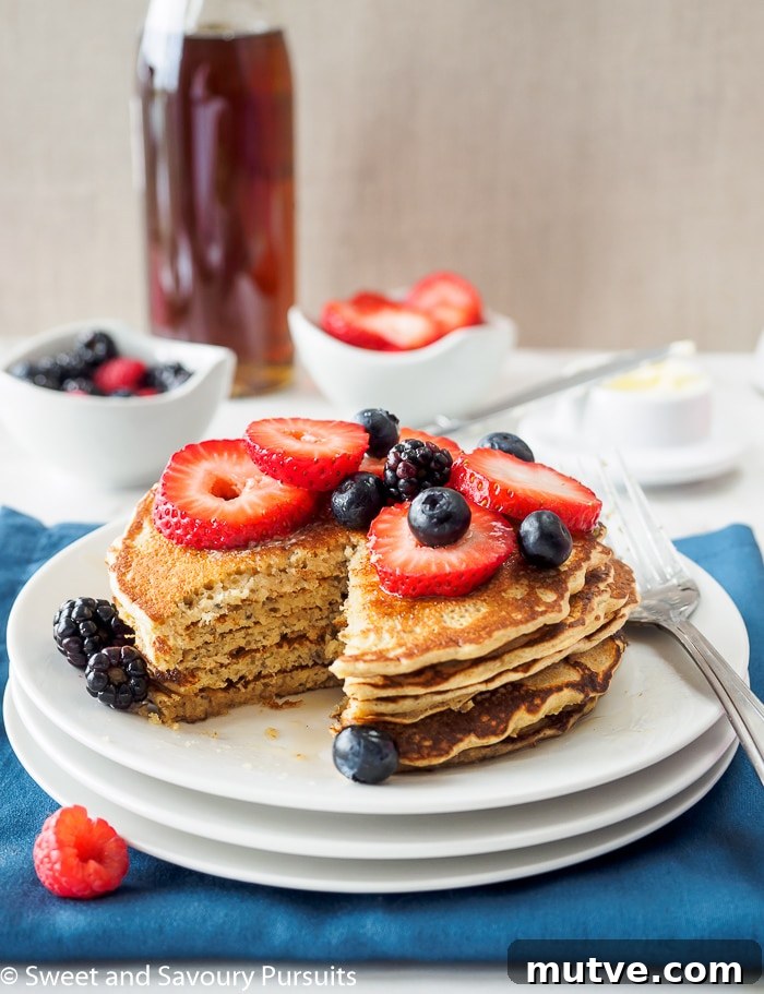 Fluffy Whole Wheat and Quinoa Flour Pancakes 4 A plate of pancakes made with whole wheat and quinoa flour.
