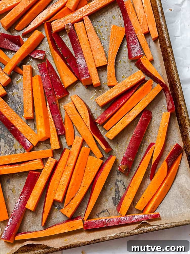 process shot showing sweet potatoes on baking tray