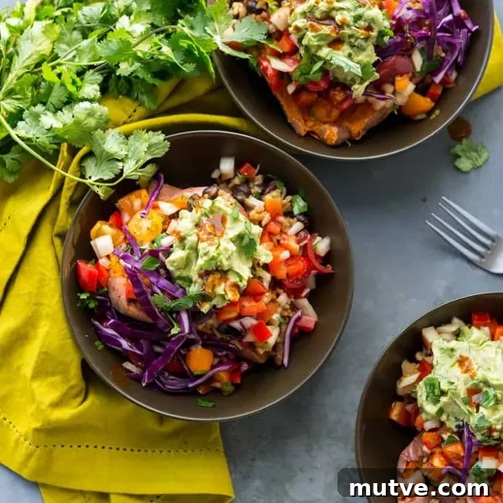 Burrito-Stuffed Sweet Potatoes - Black beans with rice, Rustic salsa and a simple guacamole stuffed inside roasted sweet potatoes
