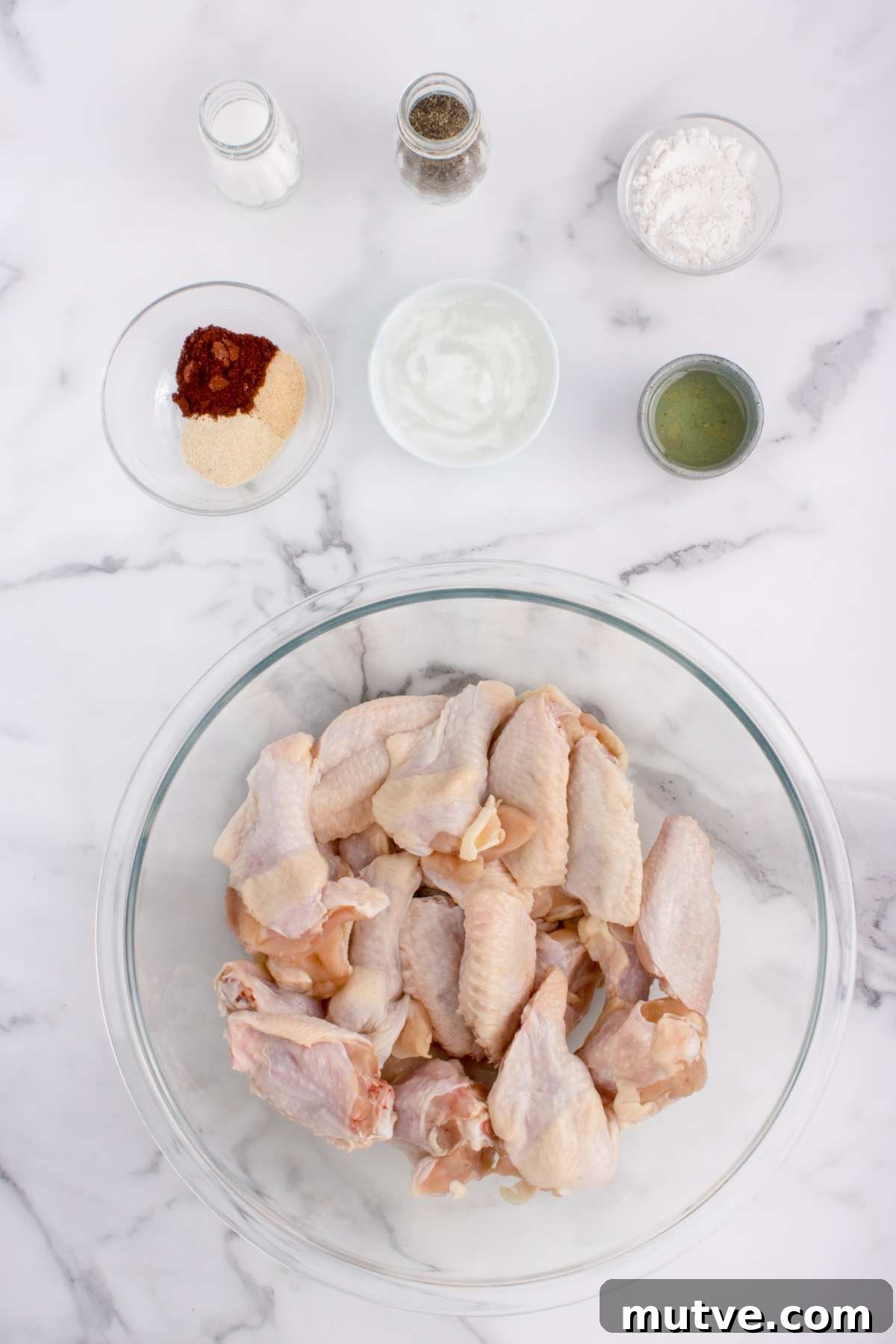 Extra Crispy Oven-Baked Chicken Wings Recipe 3 ingredients on counter.