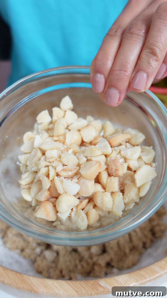 White Chocolate Macadamia Nut Cookies: Cookiemas Day 10 4 Cookie dough with white chocolate and macadamia nuts