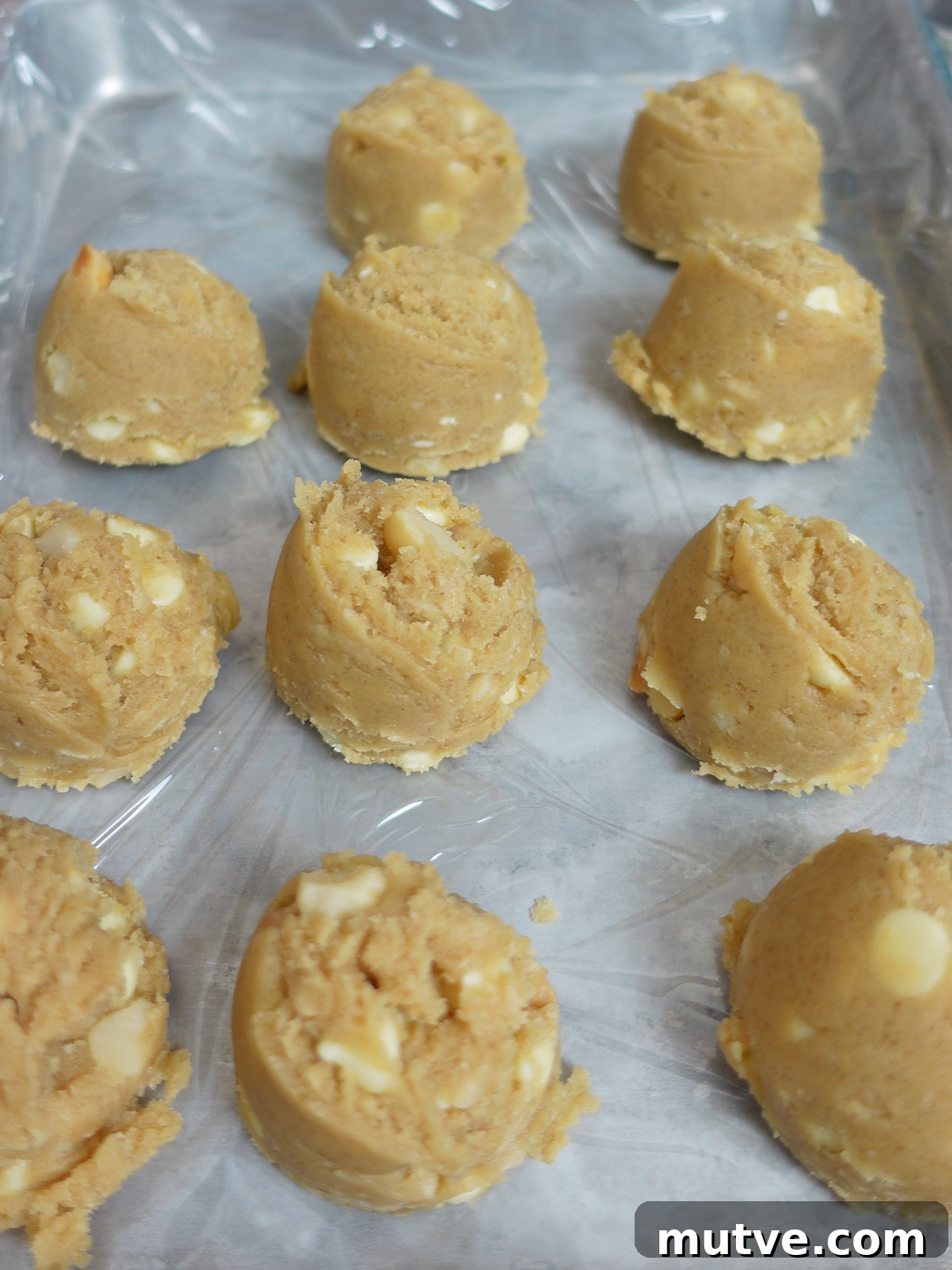 White Chocolate Macadamia Nut Cookies: Cookiemas Day 10 6 Several white chocolate macadamia nut cookies stacked