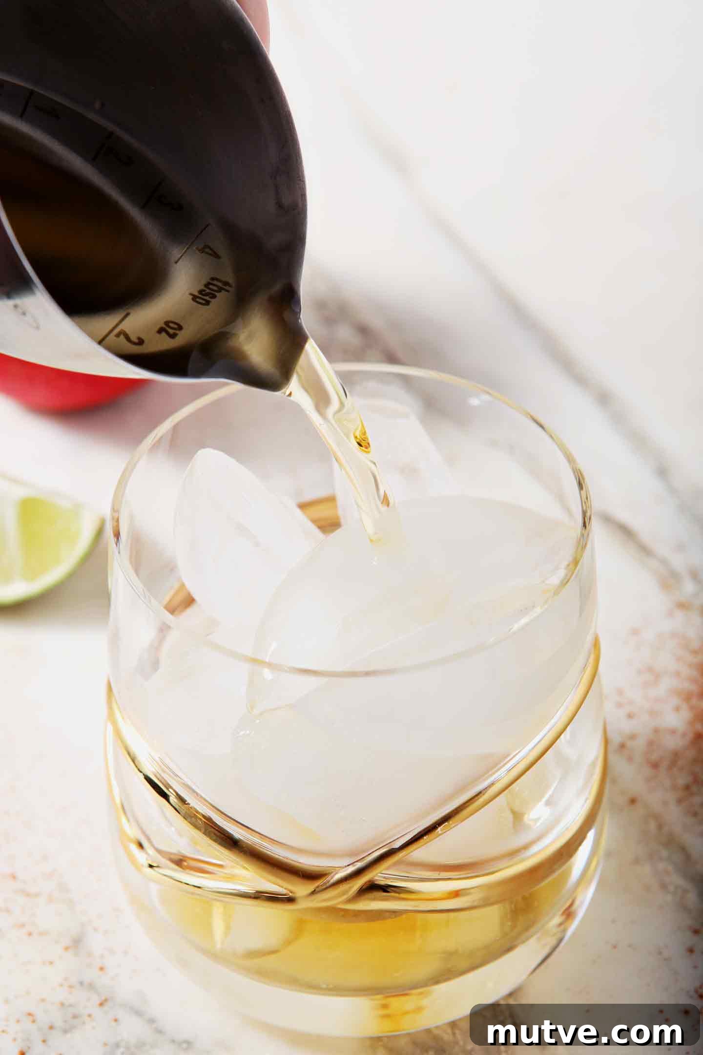 Apple Cider Moscow Mule Cocktail Recipe 4 Apple cider pours into a glass