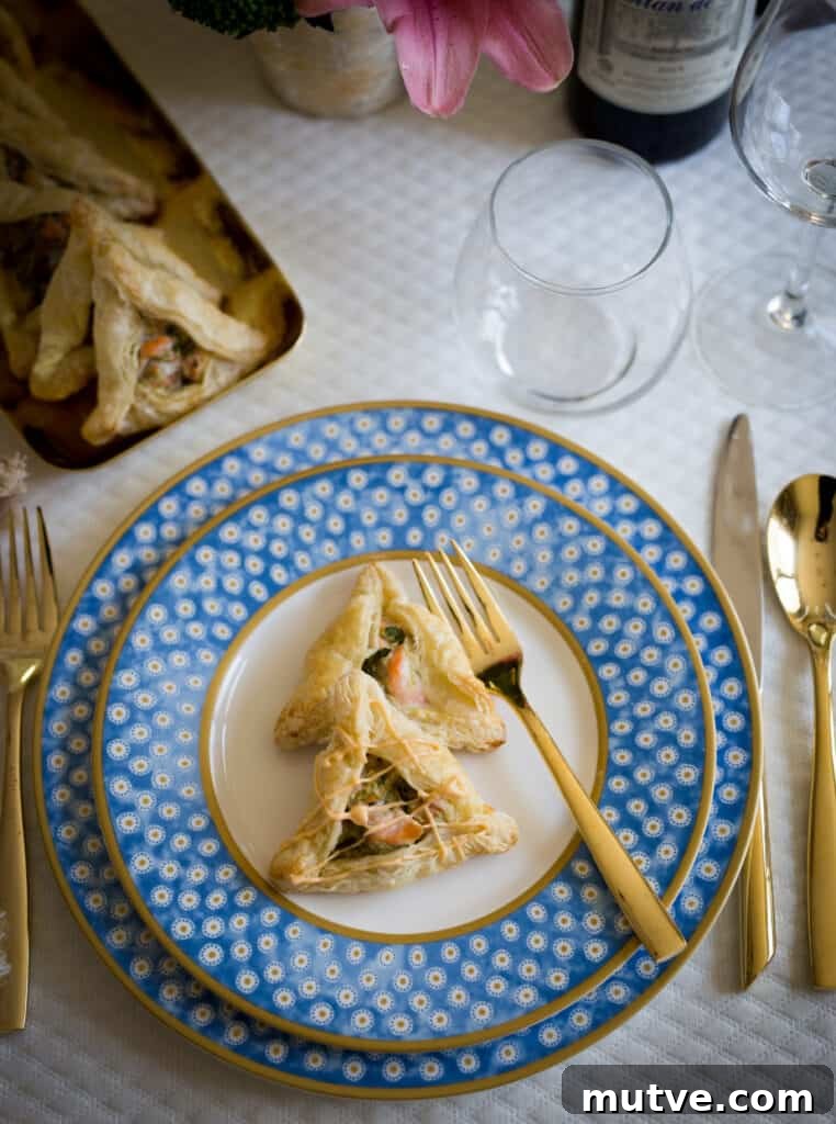 salmon hamentashen drzzled with spicy mayo