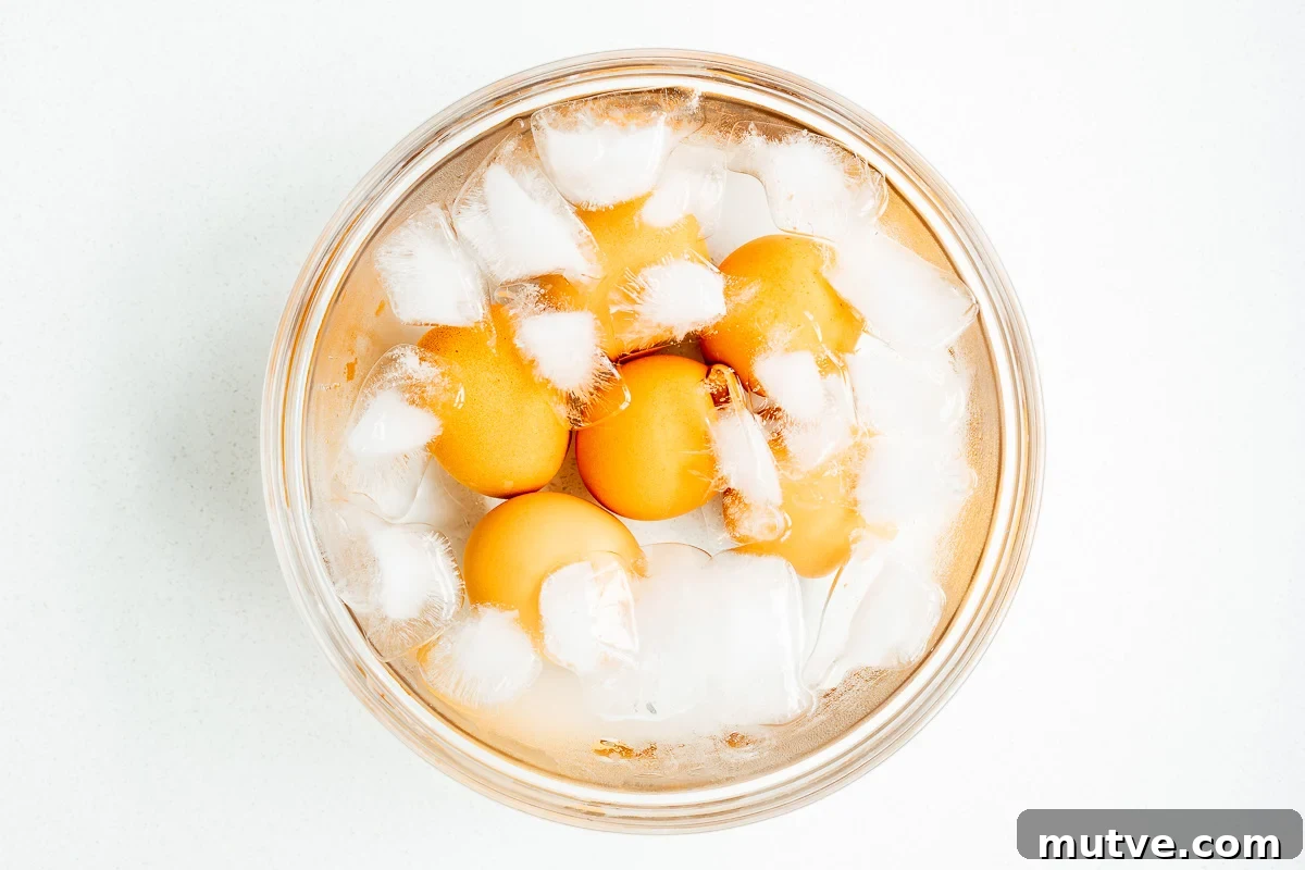 Mayak Eggs Recipe: Korean Soy-Marinated Ramen Eggs 7 Boiled eggs in an ice water bath.