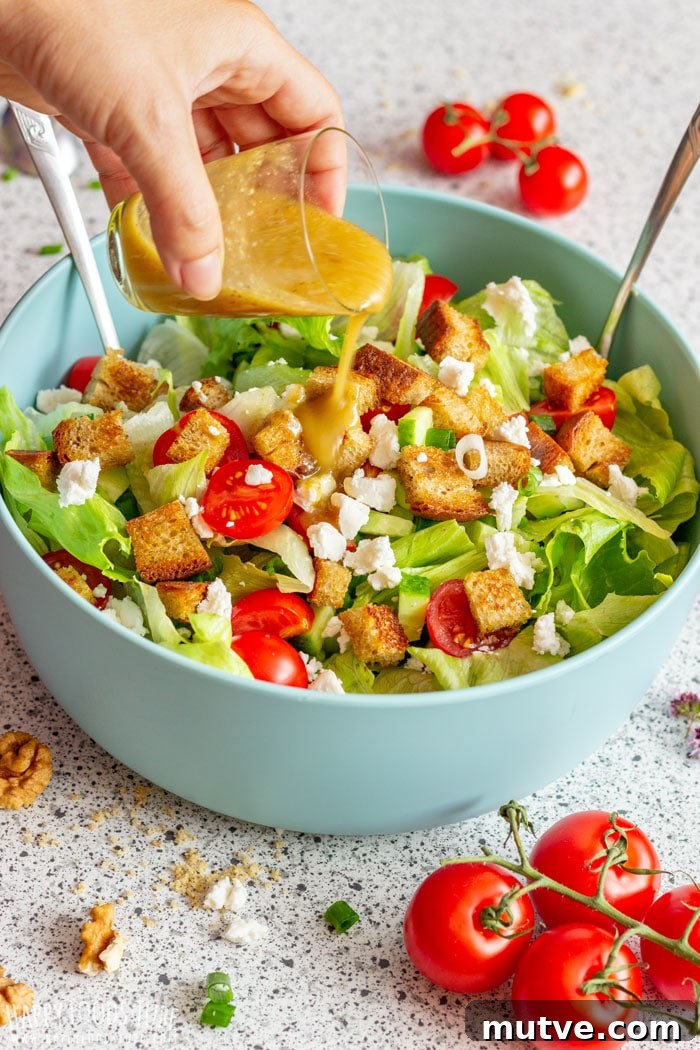 Goat Cheese Salad with Walnut Vinaigrette 6 Pouring Walnut Dressing over Goat Cheese Salad