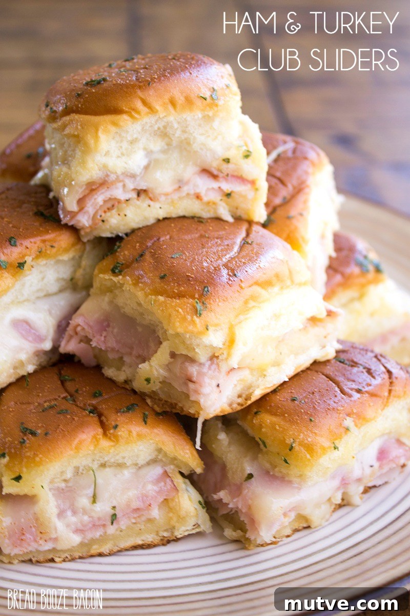 Ham and Turkey Club Sliders Recipe 2 Ham & Turkey Club Sliders are an easy appetizer that's totally addicting and perfect for game day!