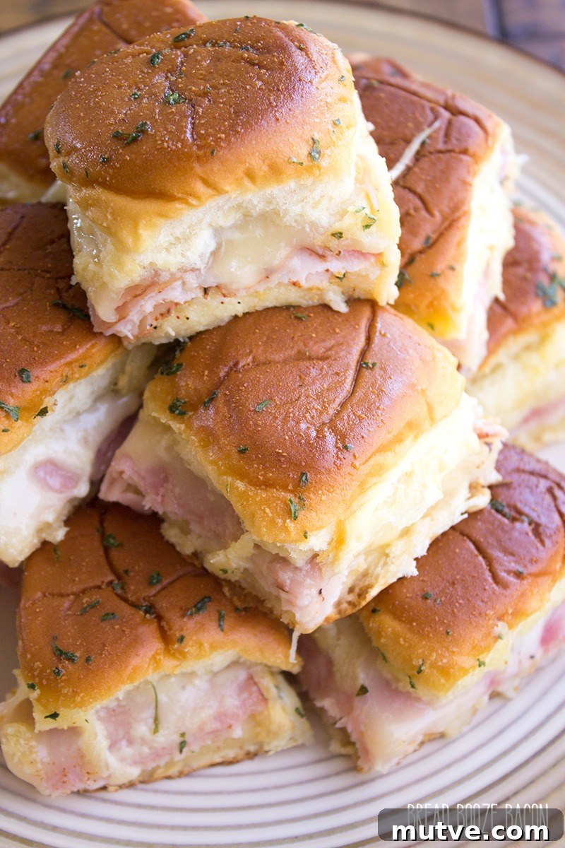 Ham and Turkey Club Sliders Recipe 3 Ham & Turkey Club Sliders are an easy appetizer that's totally addicting and perfect for game day!