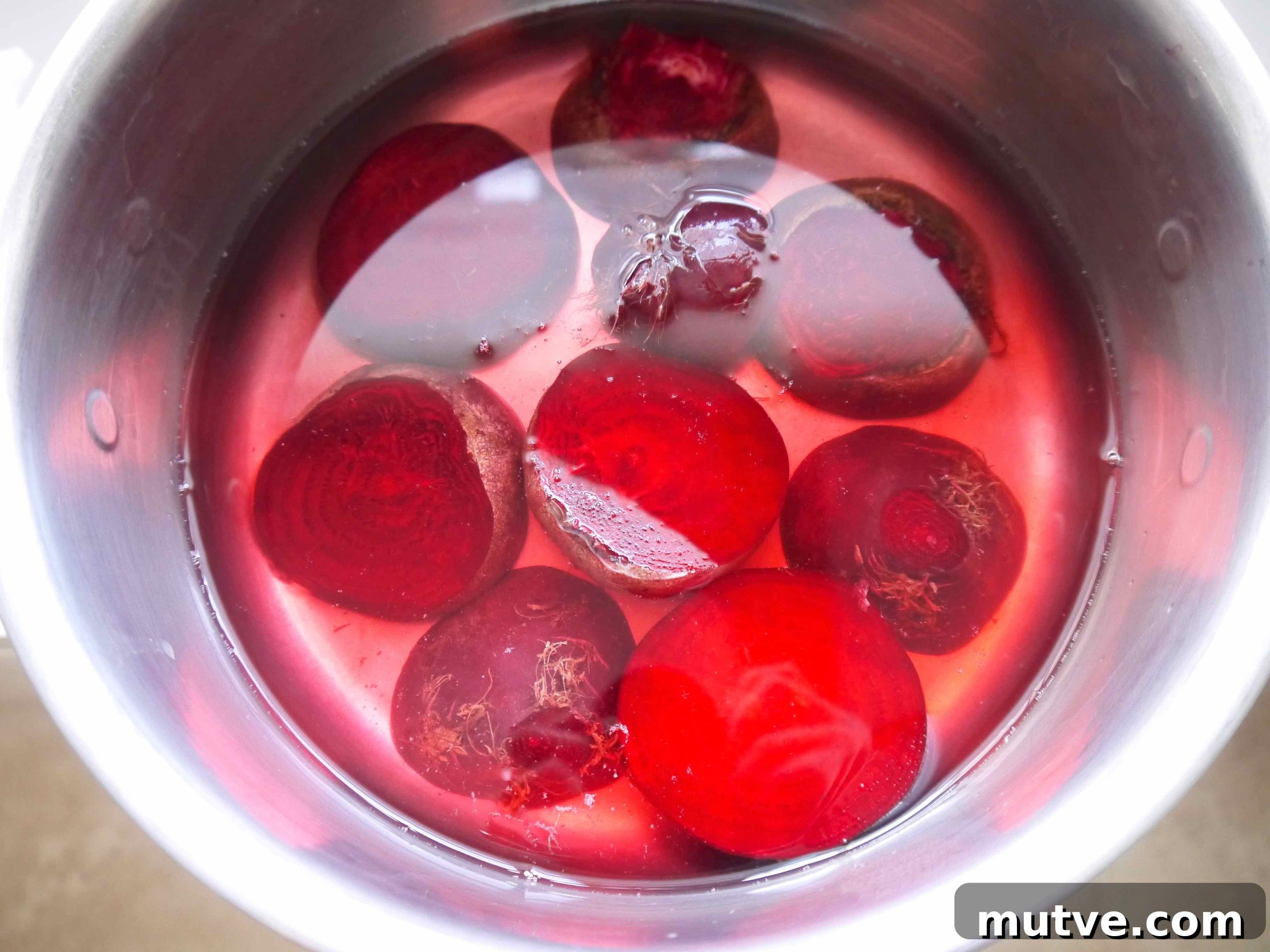 Tuna, Quinoa and Beet Salad Recipe 4 Beets in a pan covered in water.