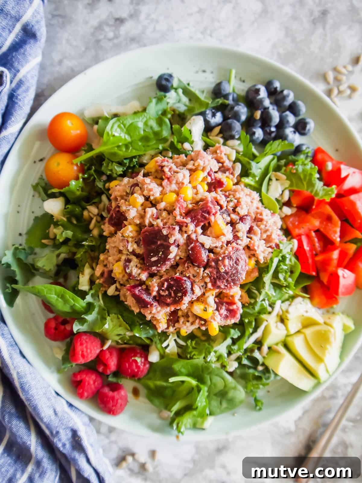 Tuna, Quinoa and Beet Salad Recipe 8 Quinoa Beet Salad in a plate with veggies and fruit.