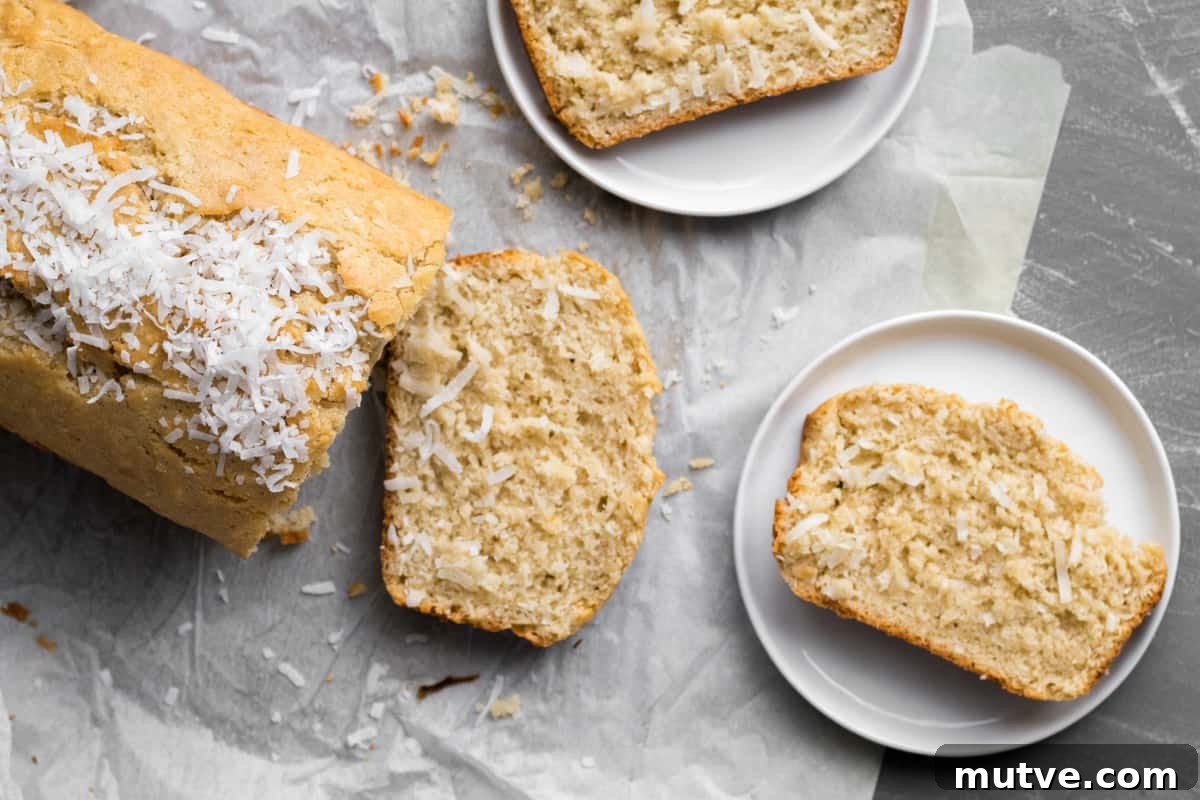One-Bowl Coconut Bread: Moist Homemade Loaf 5 slices of coconut bread on white plates